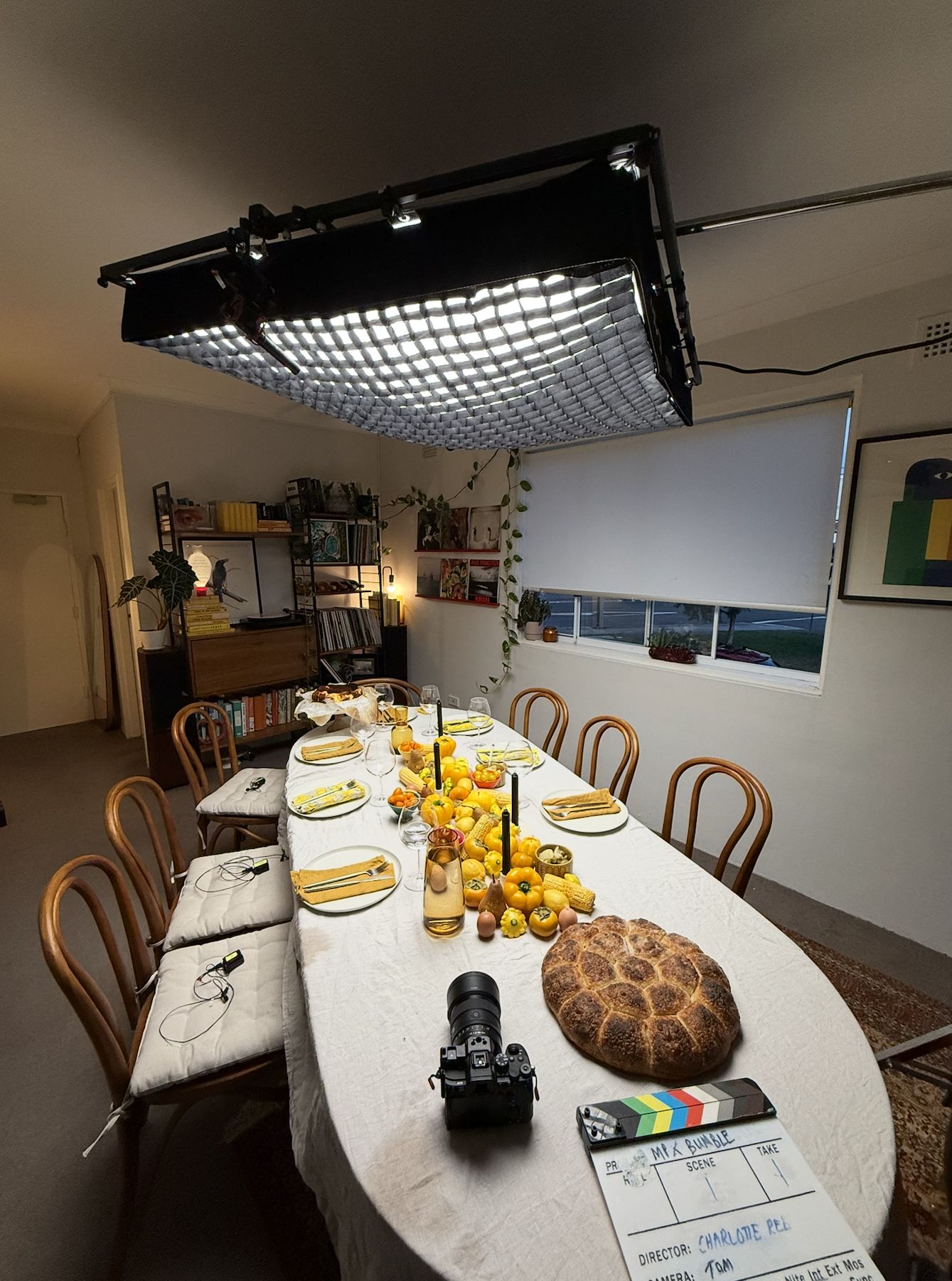 Lighting and camera set up over a dinner table ready for a shoot