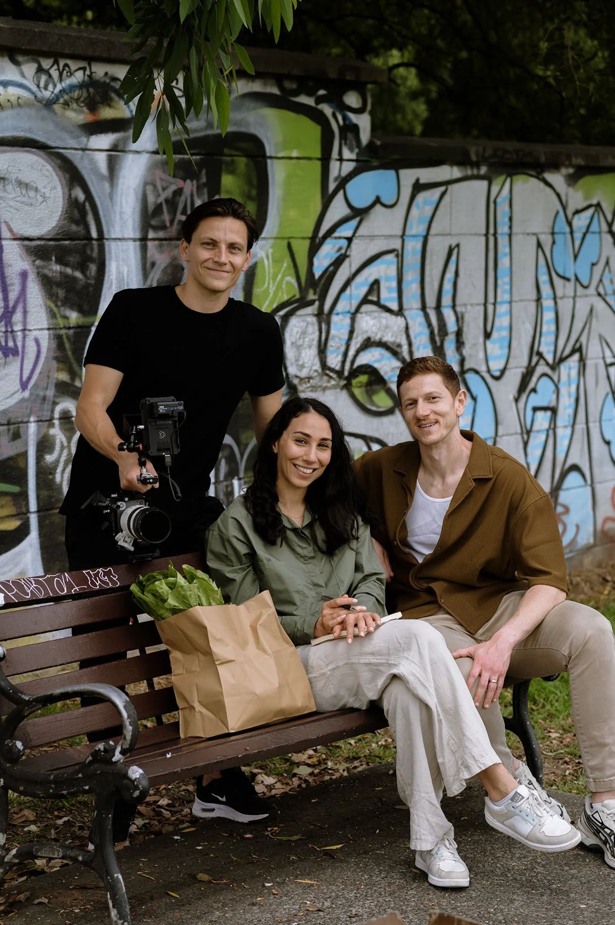 The crew and founders on a park bench in Newtown after the shoot.